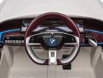 BMW i4, elektrische kinderauto, 12v, leren zitje, muziekmodule en meer! - Afbeelding 11